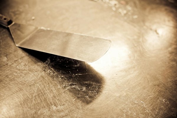 What are the impacts of ergonomic design on UK kitchen functionality?